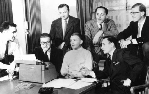 The writing staff of Caesar's Hour. Front row, left to right: Gary Belkin, Sheldon Keller, Mike Stewart and Mel Brooks. Back row, left to right: Neil Simon, Mel Tolkin and Larry Gelbart. Note the absence of Woody Allen from this picture.