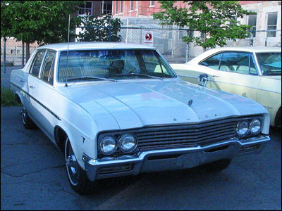 A 1965 Buick Skylark.  Mine looked a lot like this one.